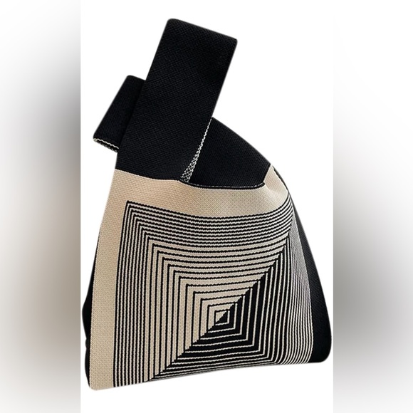 Satchel featuring a unique line design that's woven into the fabric. - Picture 2 of 5